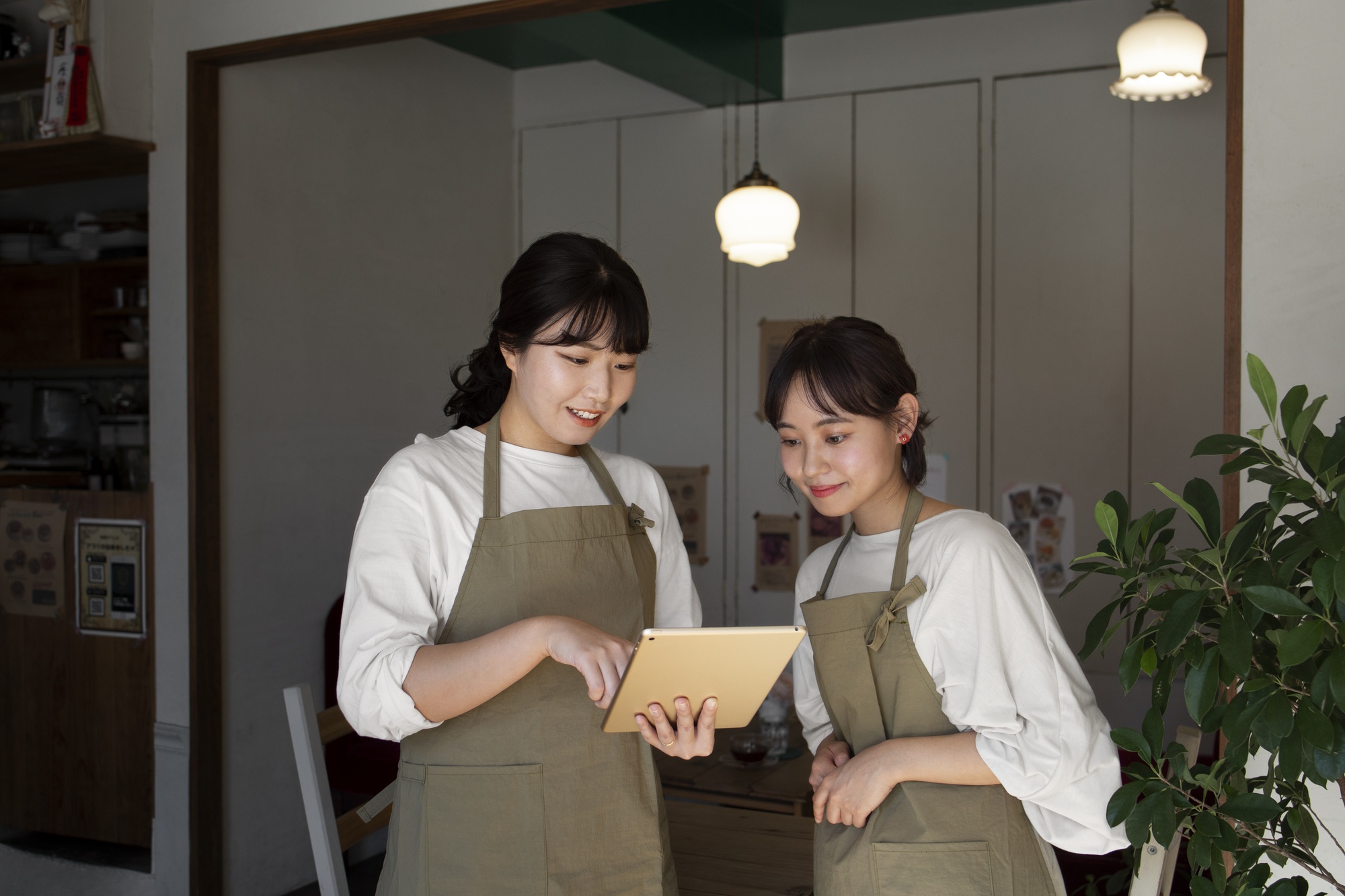 young-women-arranging-their-cake-shop.jpg